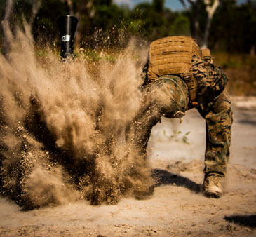 U.S. Marines fire an M252 81 mm extended range mortar system