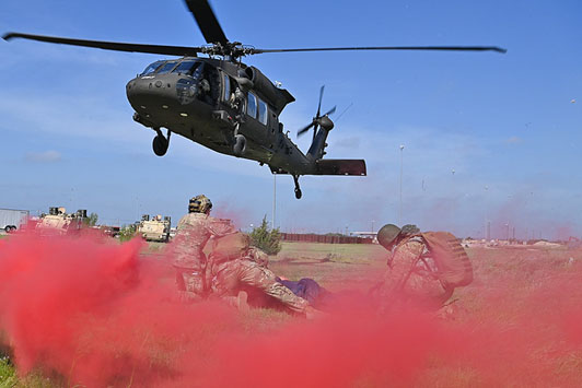 UH-60 Black Hawk helicopter prepares to land to pick up a simulated casualty