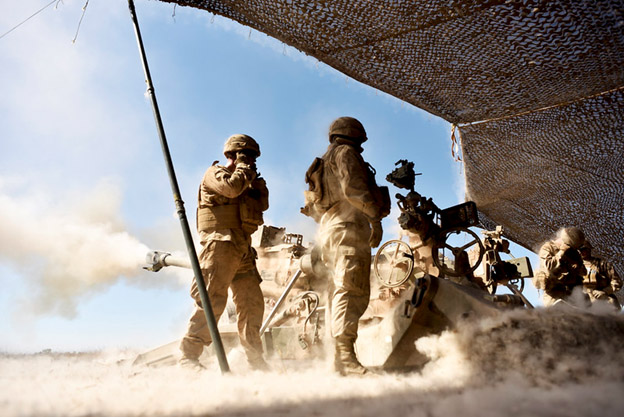 Marines fire an M777 Howitzer at known targets
